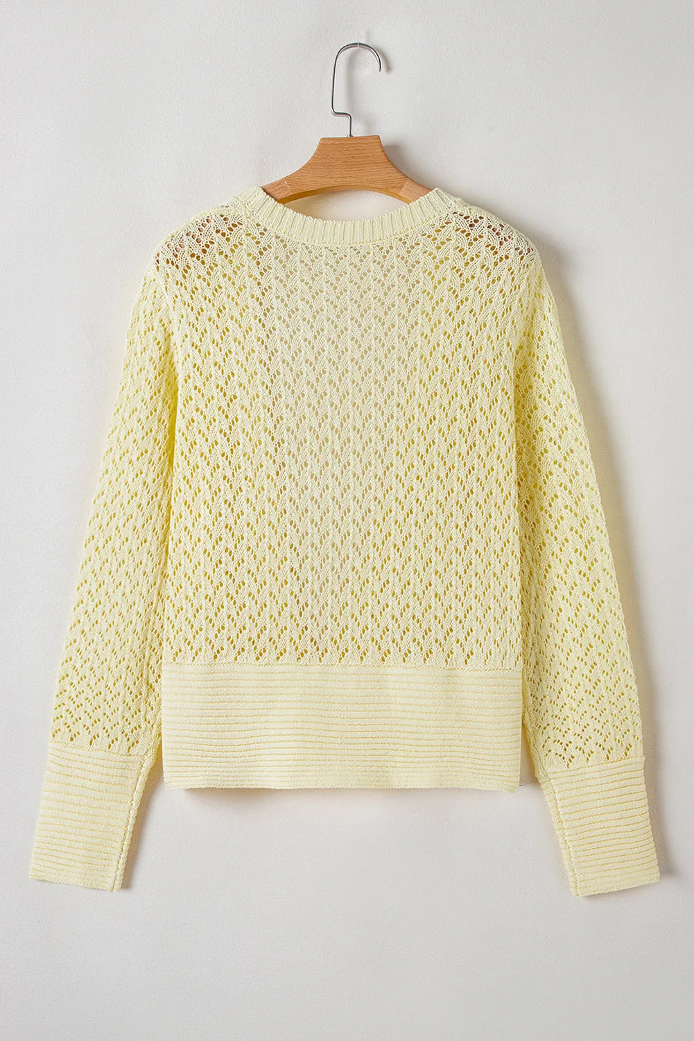 Cardigan court jaune crème en maille pointelle ouvert sur le devant